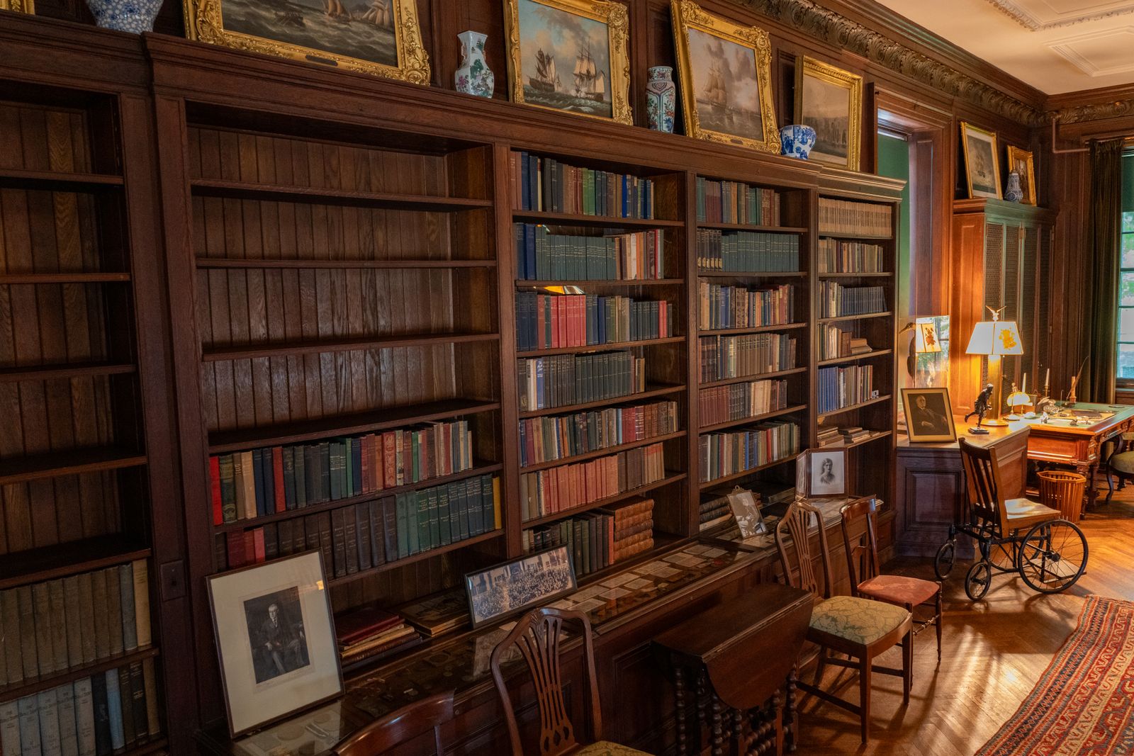 Wood-panelled law library with bound reporters and a reading chair